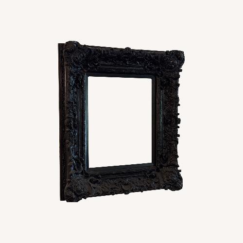 Used Black Resin Ornate Wall Mirror for sale on AptDeco