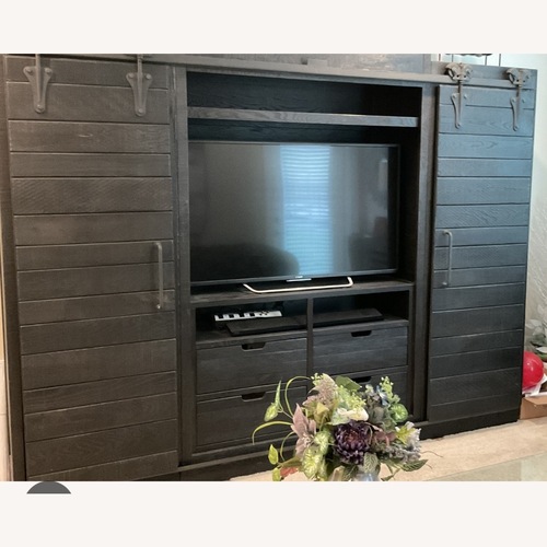 Used Arhaus Bowman Black Wood Wall Unit for sale on AptDeco