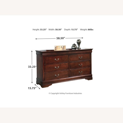 Used Wooded 6 Drawer Dresser and 2 Nightstands for sale on AptDeco