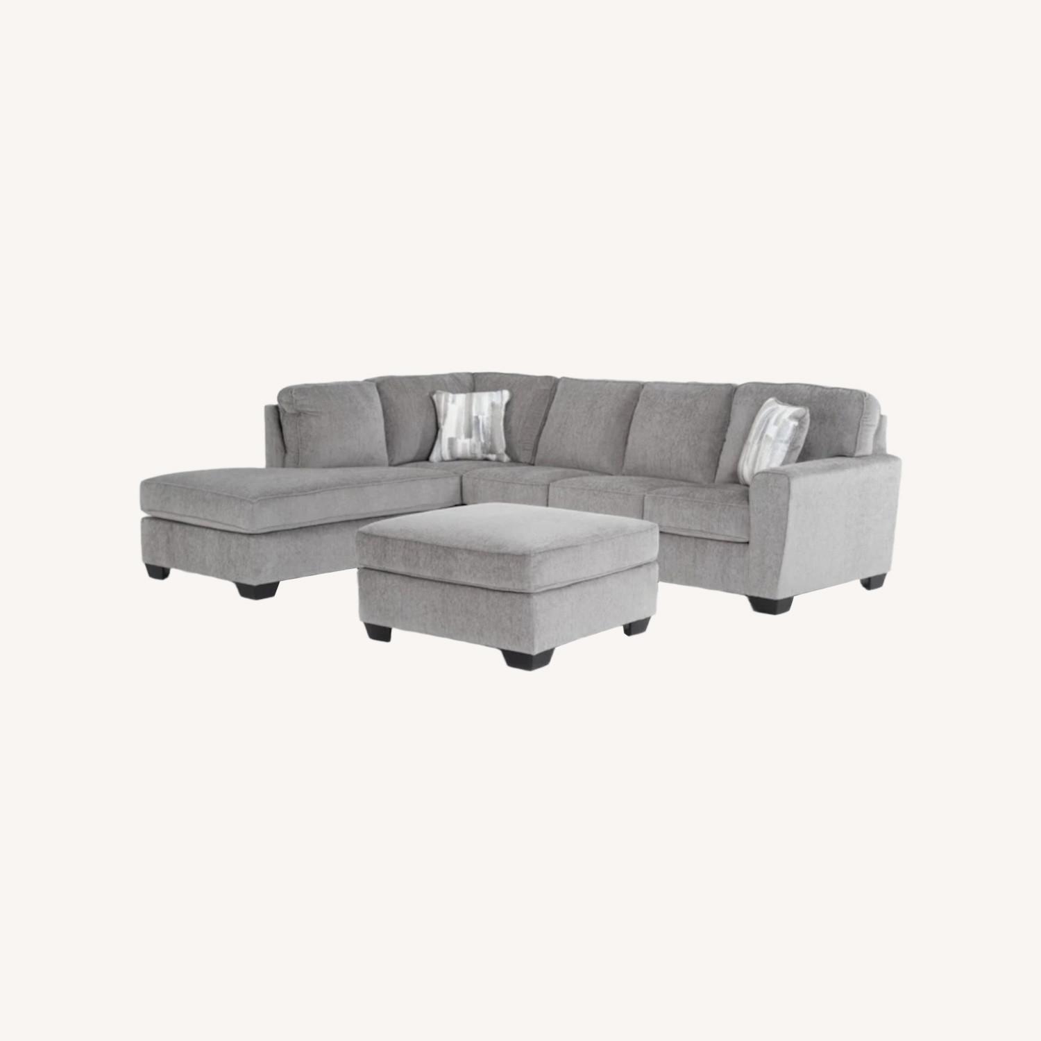 Living Spaces Mcdade Dark Gray 3+ Piece Sectional - image-0