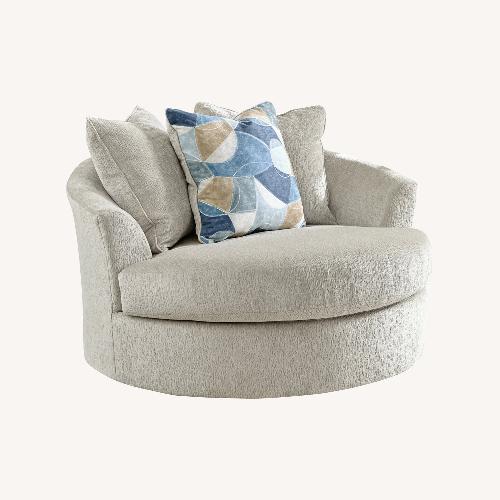 Used Ashley Furniture Benchcraft Natural Accent Chair for sale on AptDeco