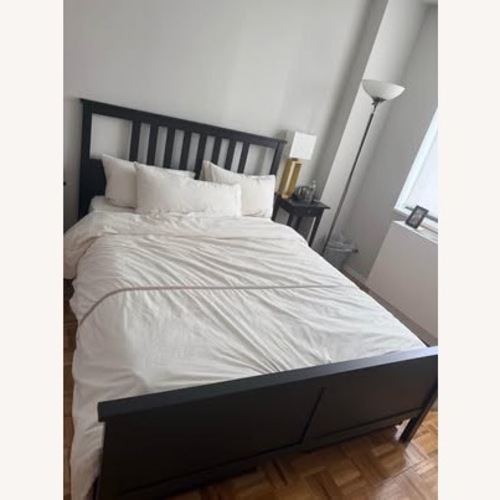 Used IKEA Black-Brown Queen Bed for sale on AptDeco