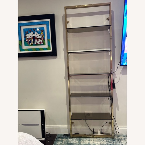 Used CB2 Tesso Brass Metal Wall Mount Bookshelf for sale on AptDeco