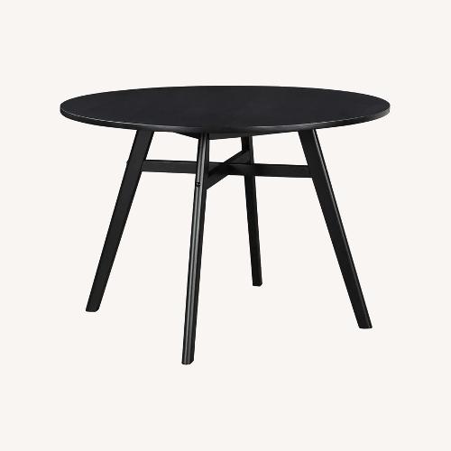 Used Black Wood Dining Table for sale on AptDeco