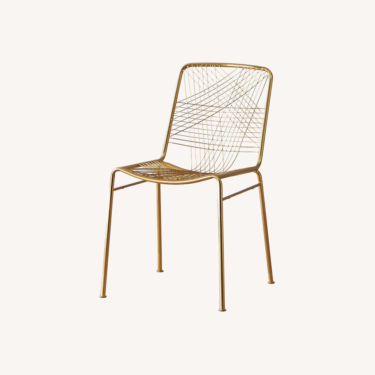 CB2 Alpha Gold Metal Dining Chairs - image-0