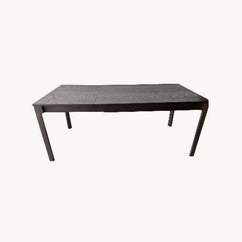 Used IKEA Dark Brown Wood Dining Table for sale on AptDeco
