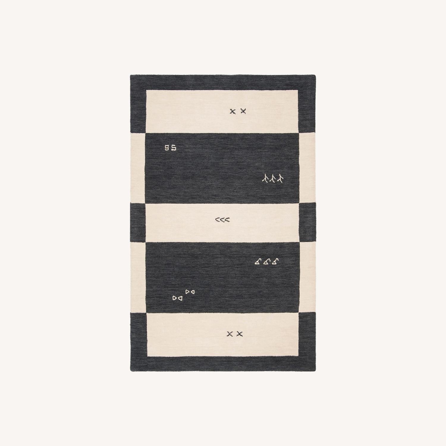 Safavieh Himalaya Black Wool Small Rug 5' x 8' - image-0