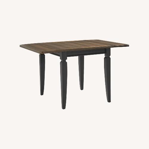 Used Country Lane Black Drop Leaf Dining Table for sale on AptDeco