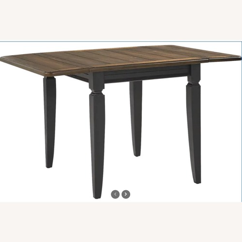 Used Country Lane Black Drop Leaf Dining Table for sale on AptDeco