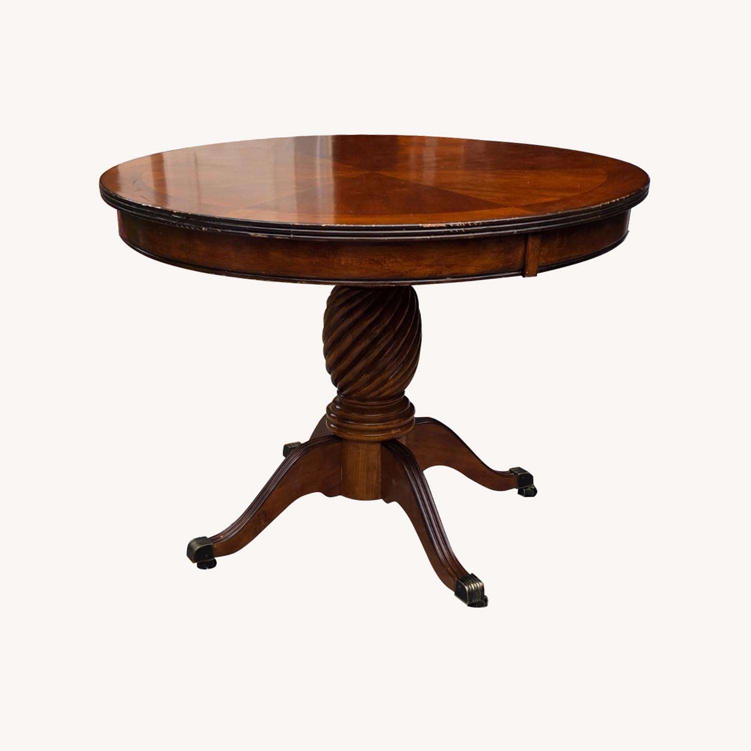 Dark Wood Pedestal Dining Table - AptDeco