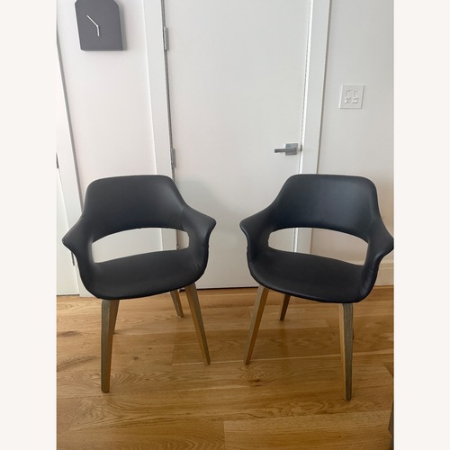 Used Article Dark Gray Faux Leather Dining Chairs for sale on AptDeco