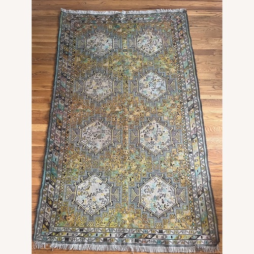 Used Antique Persian Wool Area Rug for sale on AptDeco