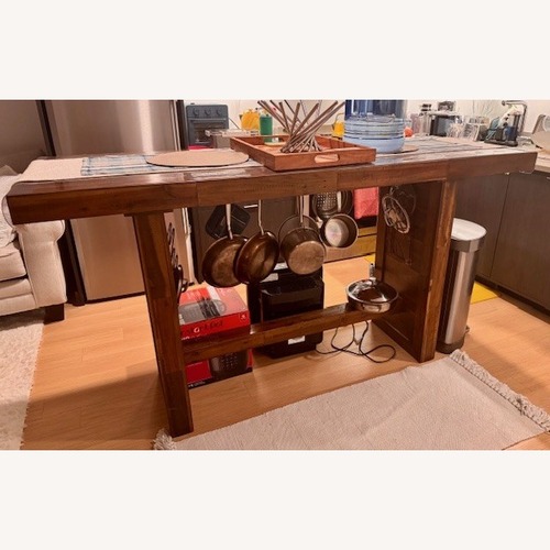 Used Coaster Fine Furniture Dark Brown Dining Table for sale on AptDeco