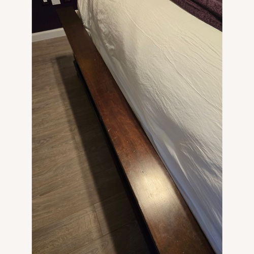 Used Vaughan Bassett Dark Brown Wood King Bed for sale on AptDeco
