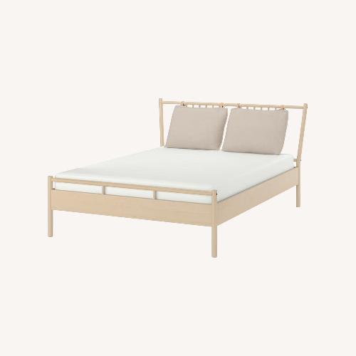 Used IKEA Björksnäs Natural Wood Queen Bed W Bed Base for sale on AptDeco