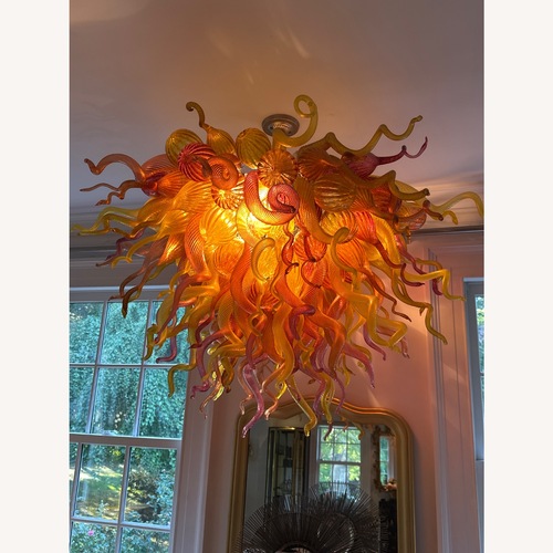 Used Chihuly Style Orange and Pink Chandelier for sale on AptDeco