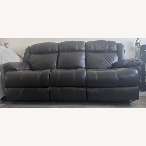 Used Leather Reclining Sofa with USB ports for sale on AptDeco