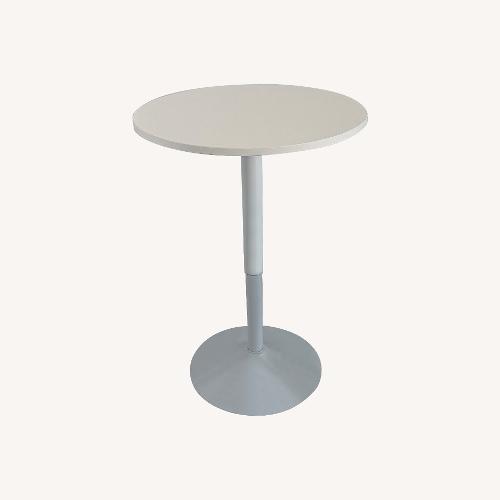 Used 24'' Round Cocktail Bar Table with Metal Base for sale on AptDeco