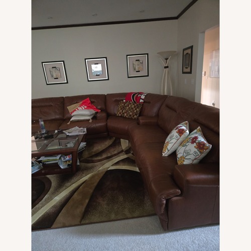 Used Leather Sectional Recliner  for sale on AptDeco