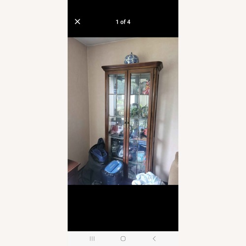 Used Natural Wood Curio Cabinet  for sale on AptDeco