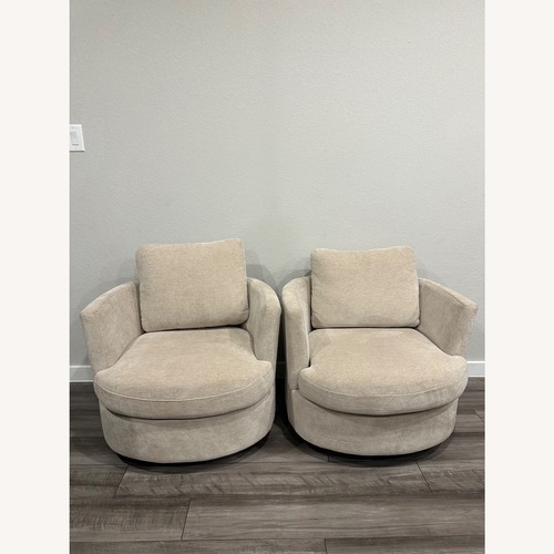 Used Polyester Slipcovered Swivel Barrel Chair for sale on AptDeco