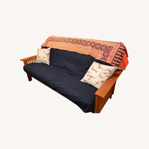 Used Cornerstone Light Brown Wood Queen Size Futon for sale on AptDeco