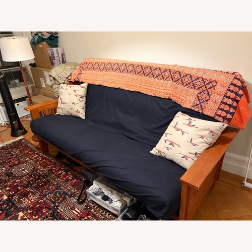 Used Cornerstone Light Brown Wood Queen Size Futon for sale on AptDeco