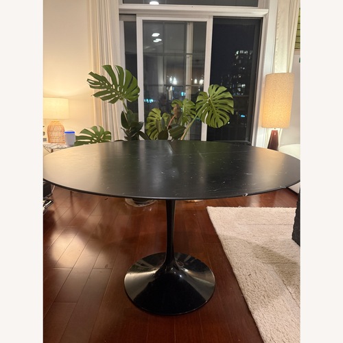 Used Knoll Saarinen Black Marble Dining Table for sale on AptDeco