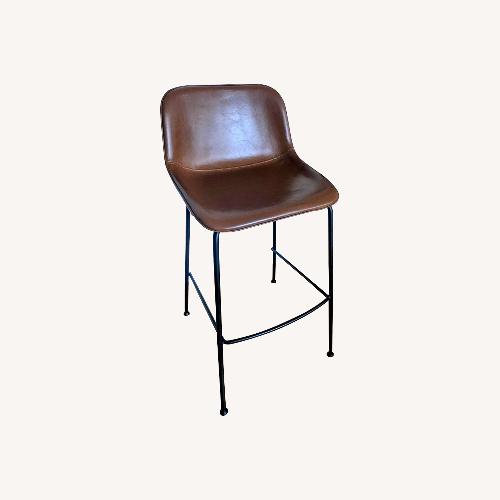 Used EQ3 Brown Leather Stools for sale on AptDeco