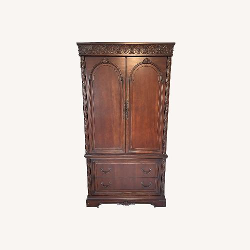 Used Vintage/Antique Finds Dark Brown Wood Armoire for sale on AptDeco