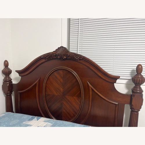 Used Raymour & Flanigan Dark Brown Queen Bed for sale on AptDeco