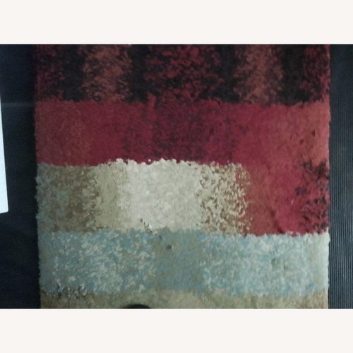 Used World Market Small Rug 5' x 8' for sale on AptDeco