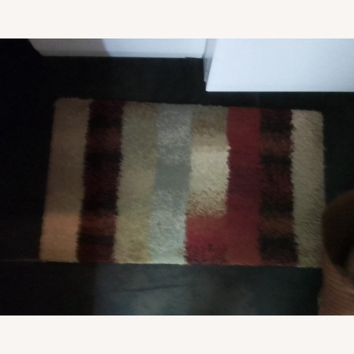 Used World Market Small Rug 5' x 8' for sale on AptDeco