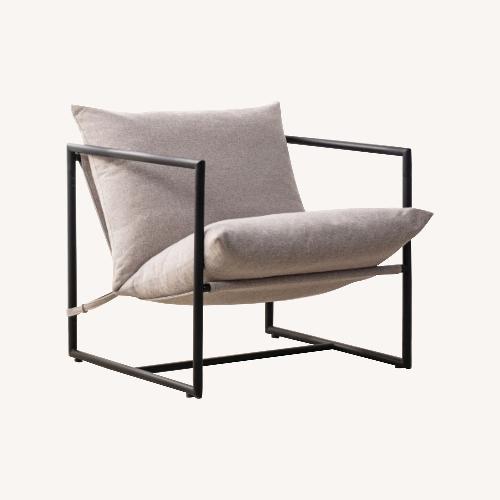 Used Metal Framed Indoor Sling Accent Chair for sale on AptDeco