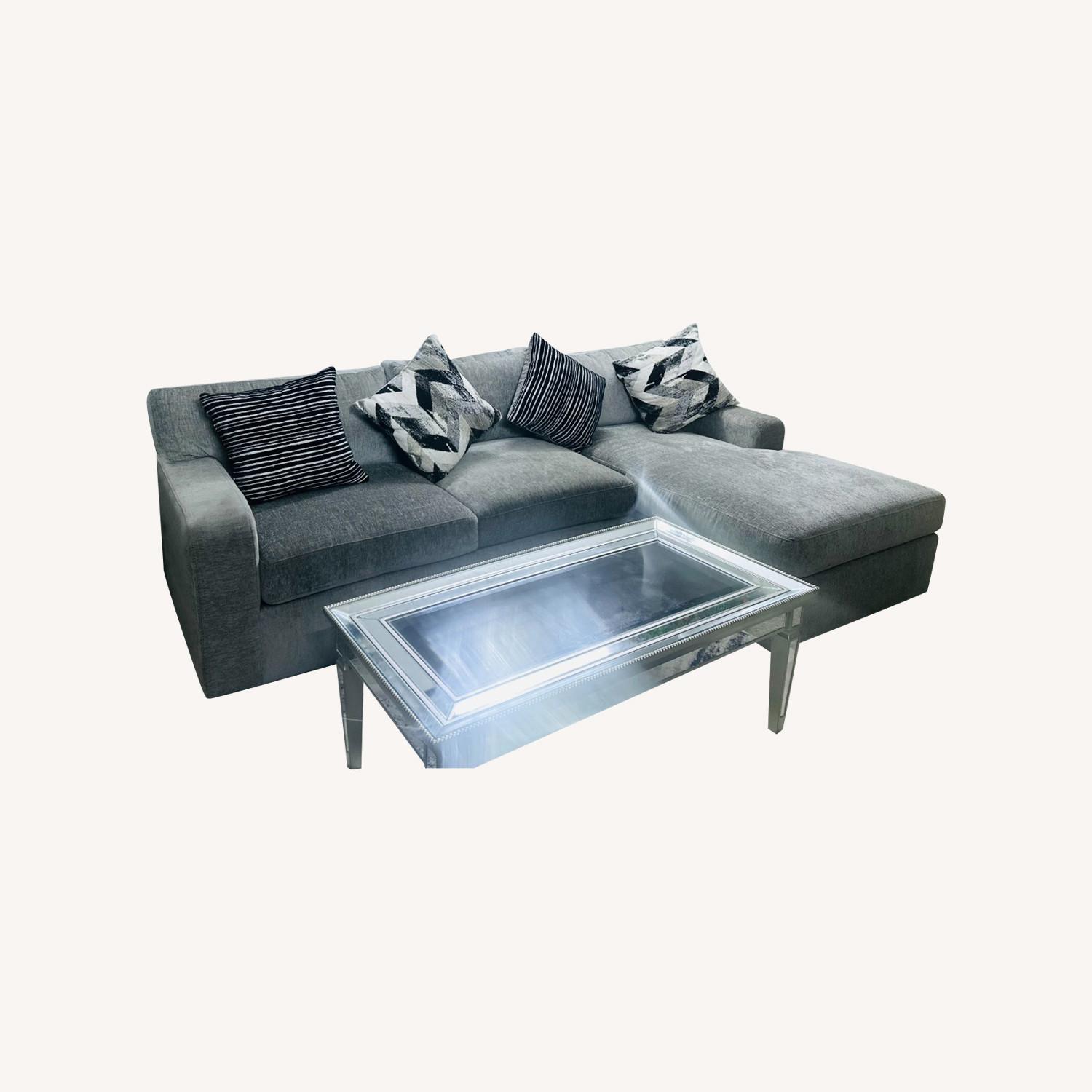 Rooms to go light Gray Fabric Sectional sofa set with chaise, 4 Accent Cushions, Mirrored Coffee & Side Tables, and Gray/Rug - image-0
