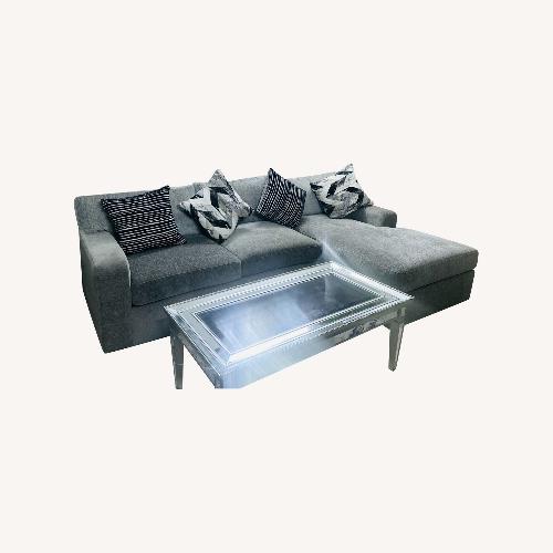 Used Rooms to go light Gray Fabric Sectional sofa set with chaise, 4 Accent Cushions, Mirrored Coffee & Side Tables, and Gray/Rug for sale on AptDeco