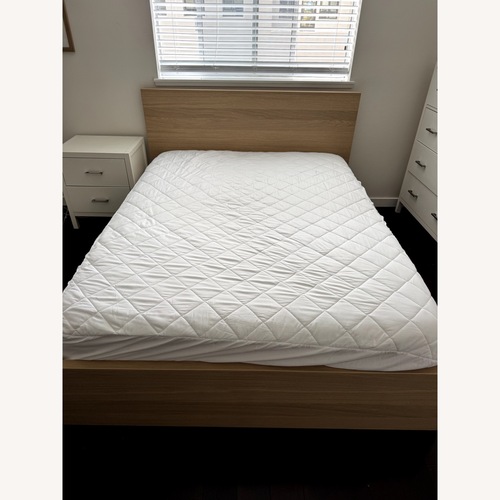 Used IKEA Malm Queen Bed with 4 Storage Drawers for sale on AptDeco
