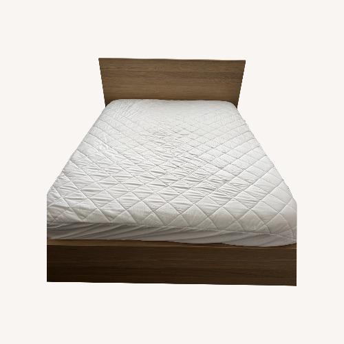 Used IKEA Malm Queen Bed with 4 Storage Drawers for sale on AptDeco