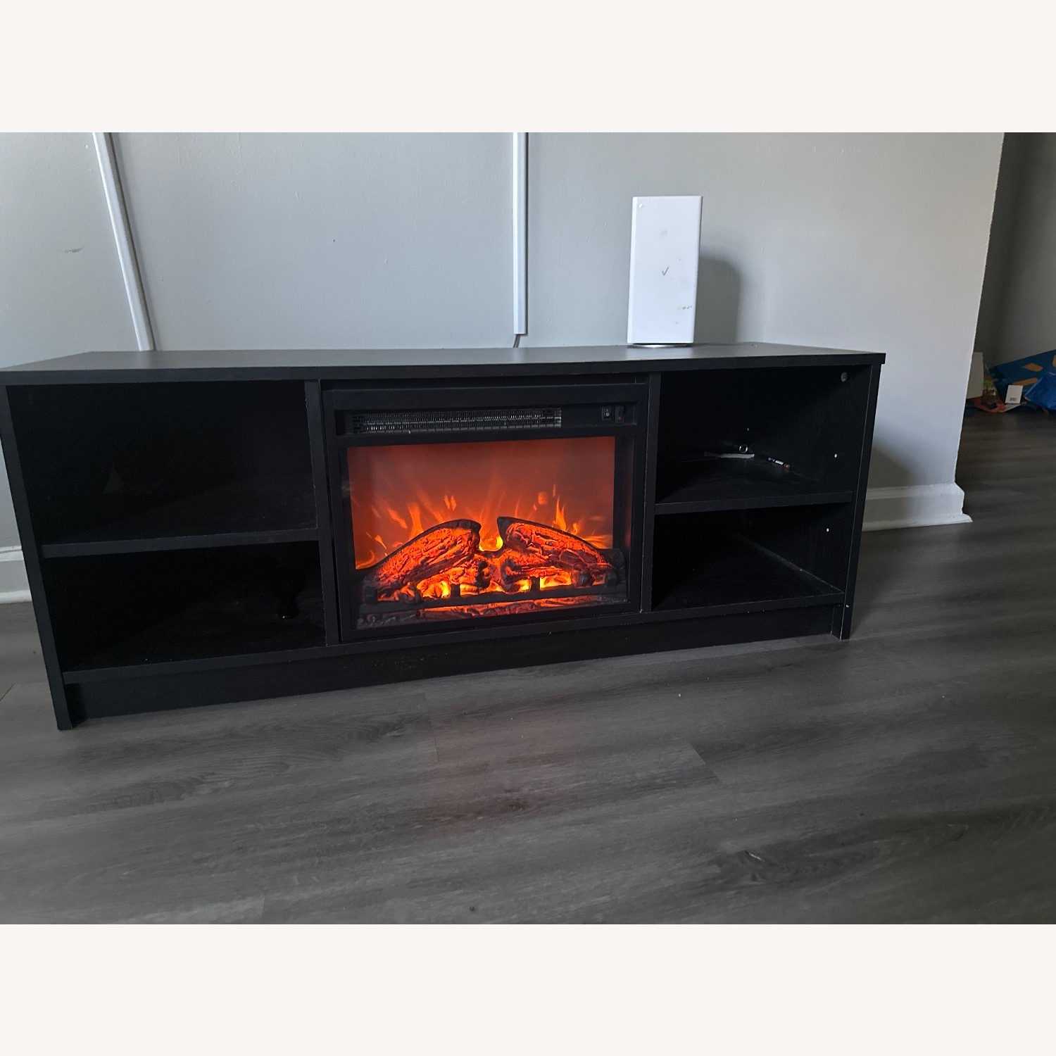 Mainstays Fireplace TV Stand, for TVs up to 55", Black Oak - image-1