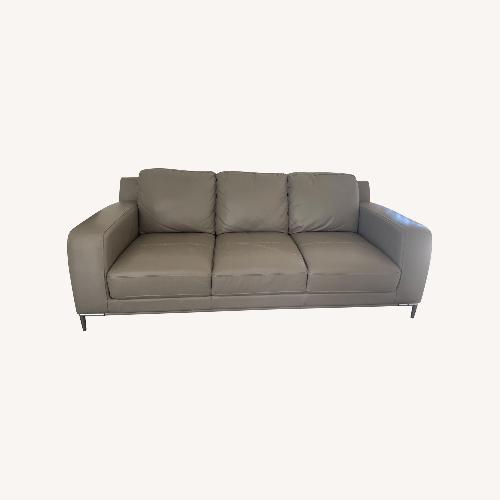 Used Vintage/Antique Finds Dark Gray 2 Piece Sectional for sale on AptDeco