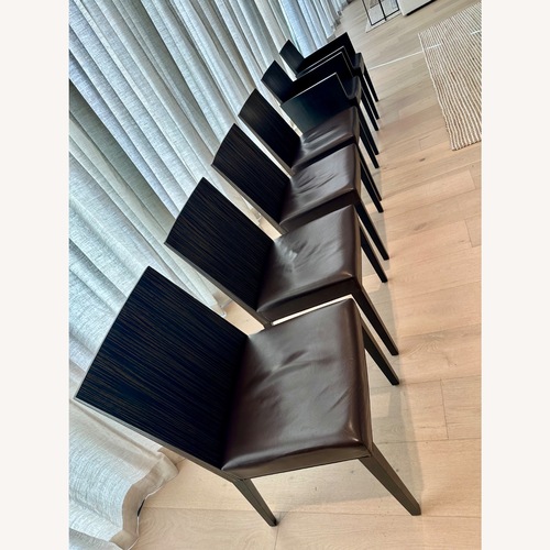 Used Roche Bobois Brown Wood & Leather Dining Chairs for sale on AptDeco
