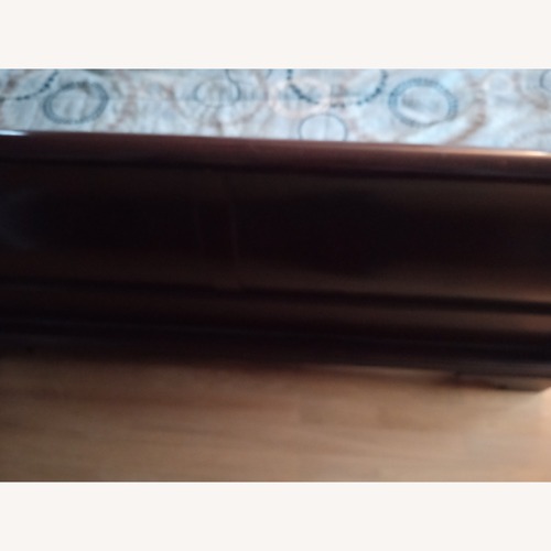 Used Dark Brown Wood Queen Bed for sale on AptDeco