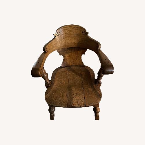 Used Antique Light Brown Wood Armchair for sale on AptDeco