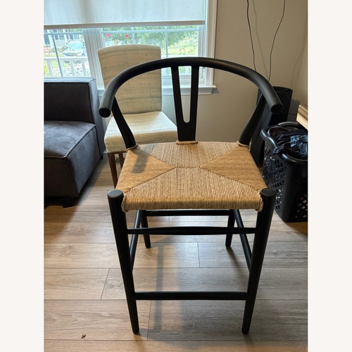 Used Four Hands Muestra Black Wood Stool for sale on AptDeco