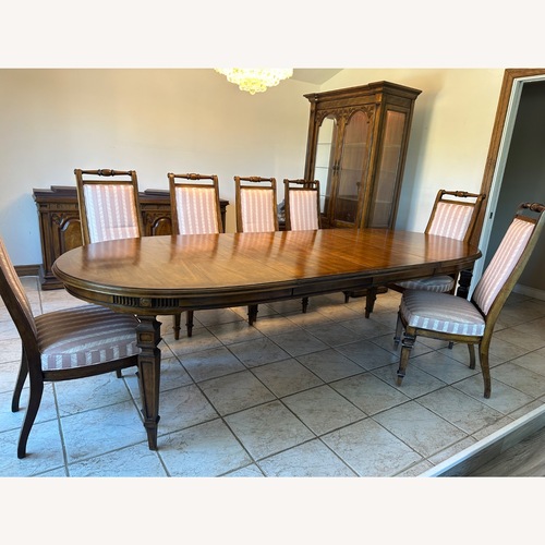 Used Vintage/Antique Dark Brown Wood Dining Table for sale on AptDeco