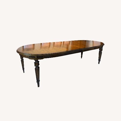Used Vintage/Antique Dark Brown Wood Dining Table for sale on AptDeco
