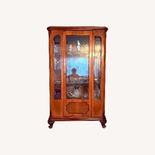 Used Light Brown Wood Armoire for sale on AptDeco