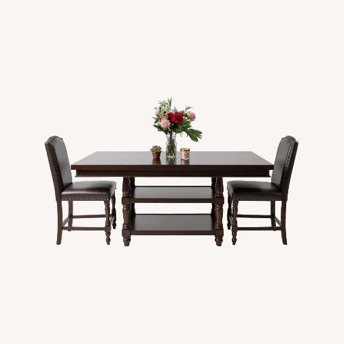 Used Ashley Solid Wood Dining Table with 6 Chairs for sale on AptDeco