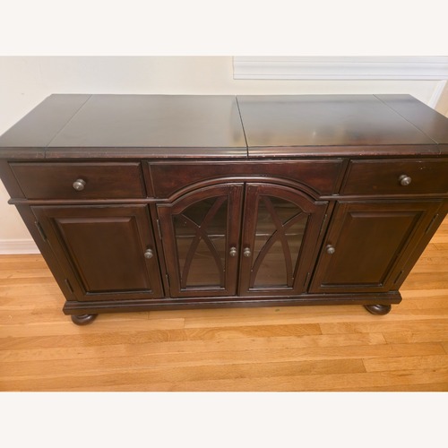 Used Macy's Daria Dark Brown Wood Sideboard for sale on AptDeco