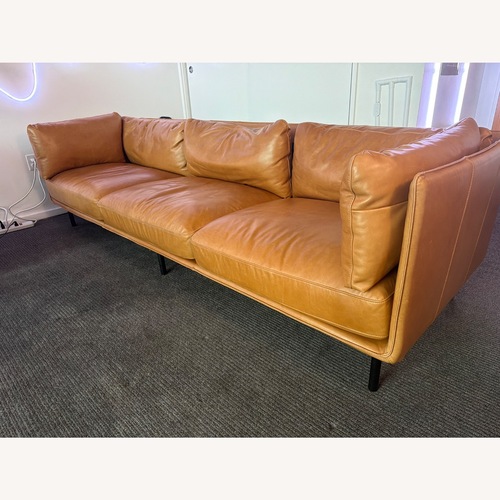 Used Crate & Barrel Wells Grande Leather Sofa + Ottoman – Cayenne for sale on AptDeco